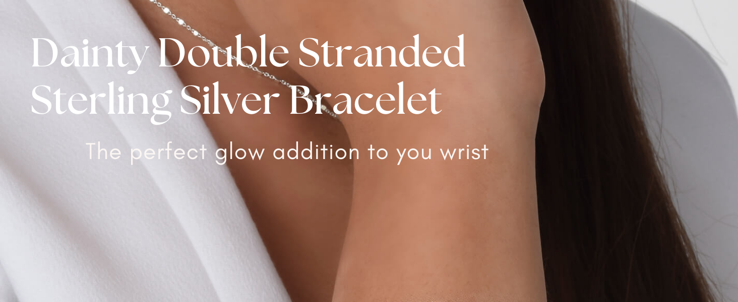 women with a sterling silver chain necklace and bracelet set